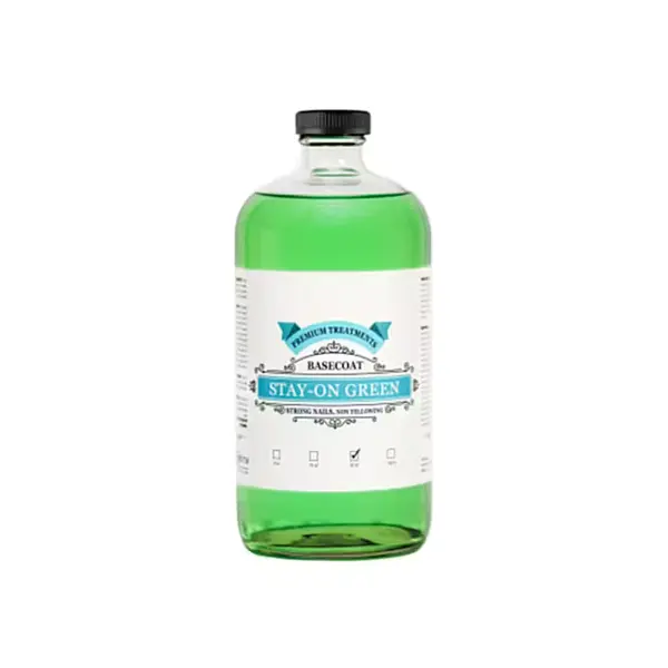 A clear plastic bottle of BeBeauty Green Base Coat Stay-On 32oz with a black cap, filled with green liquid, isolated on a white background.