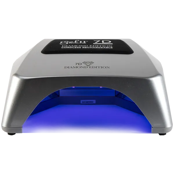 The Gel II Cordless Lamp 7D Diamond Edition is a silver LED nail lamp with a black label on top, emitting blue light from underneath. This rechargeable device brings professional-level quality to your manicures.