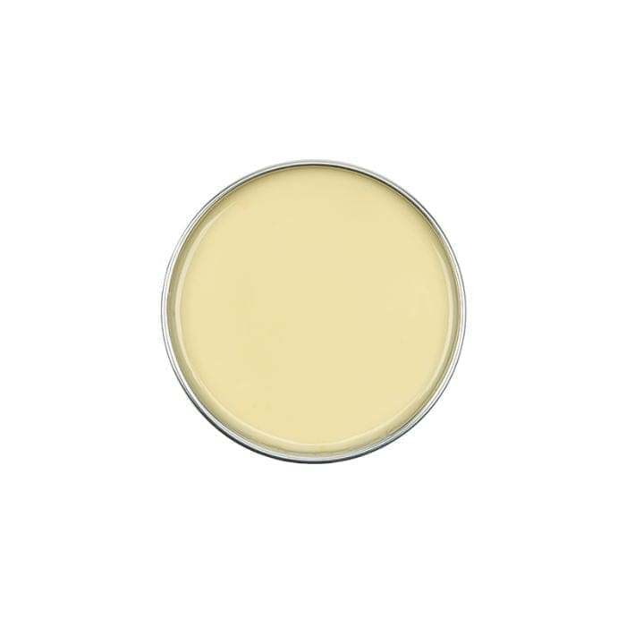 A top view of a circular open can filled with condensed milk, resembling the smooth surface of GiGi All Purpose Hard Wax 0332.