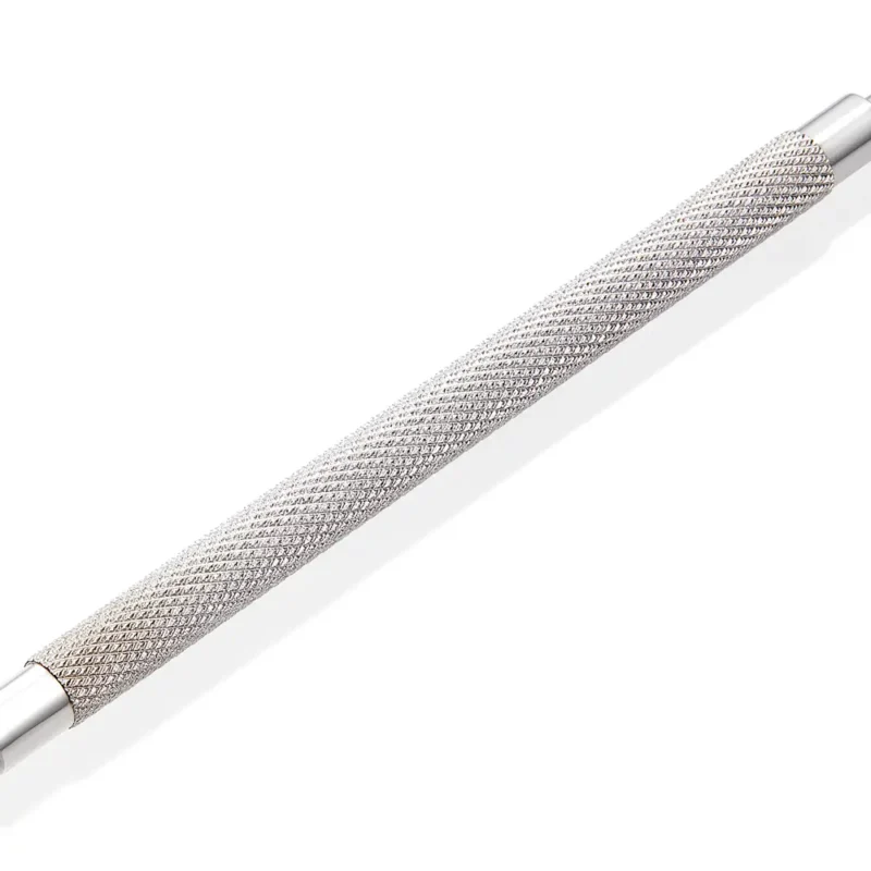 A close-up image of a Nghia Pusher P-03 (S-506) Box Of 10 nail file with a textured surface and silver-colored end caps, on a white background.