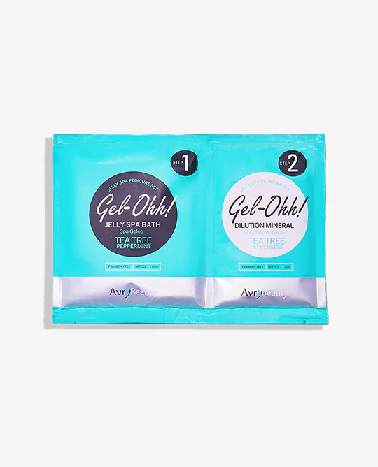 Two packets of Tea-Tree & Peppermint face wipes on a white background.