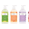 Five bottles of CND Scentsations Hand & Body Lotion 33oz in various scents are displayed in a row. Each bottle has a different color and fruit design on the label, making them both visually appealing and delightful to use.