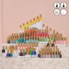 A stack of apres Gel Color 0.5oz bottles on a countertop.