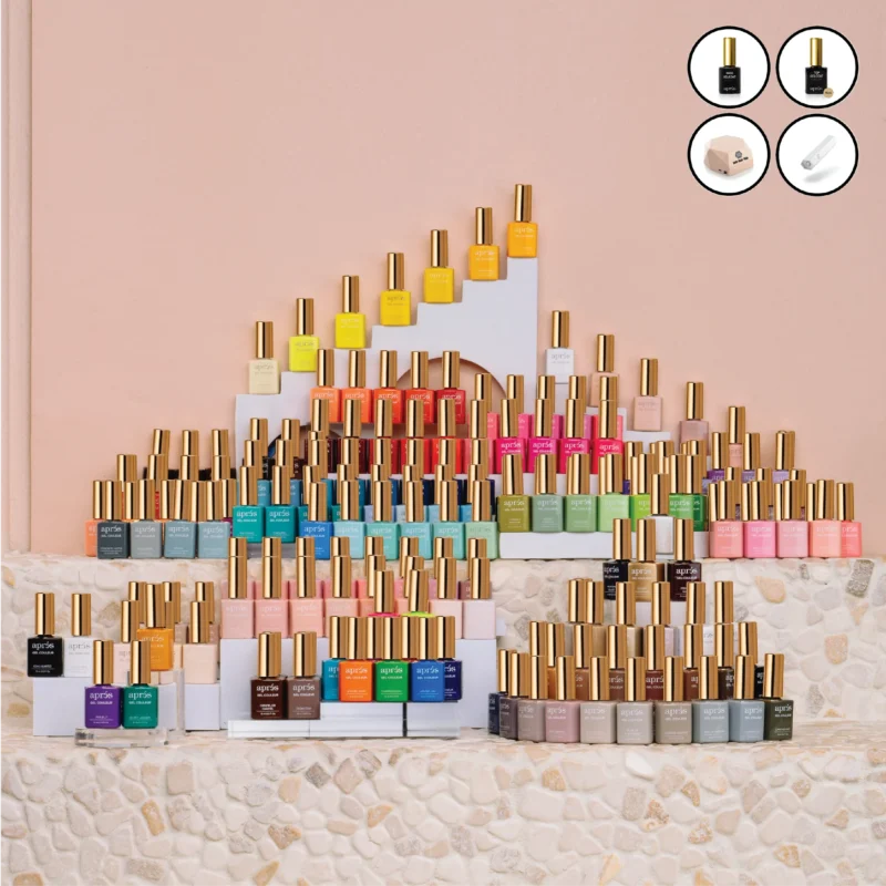 A stack of apres Gel Color 0.5oz bottles on a countertop.