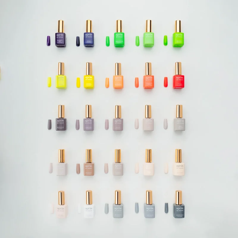 A diverse selection of Apres Gel Color 0.5oz nail polishes in various shades.