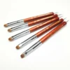 A set of KYE French Brushes with Dotting Tool on a white surface.