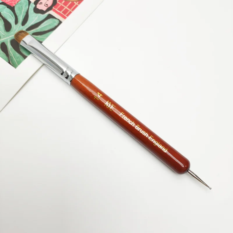 A KYE French Brush with Dotting Tool with a wooden handle for painting on paper.