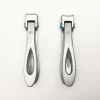 A pair of KYE Wide Jaw Toe Nail Clippers on a white surface.