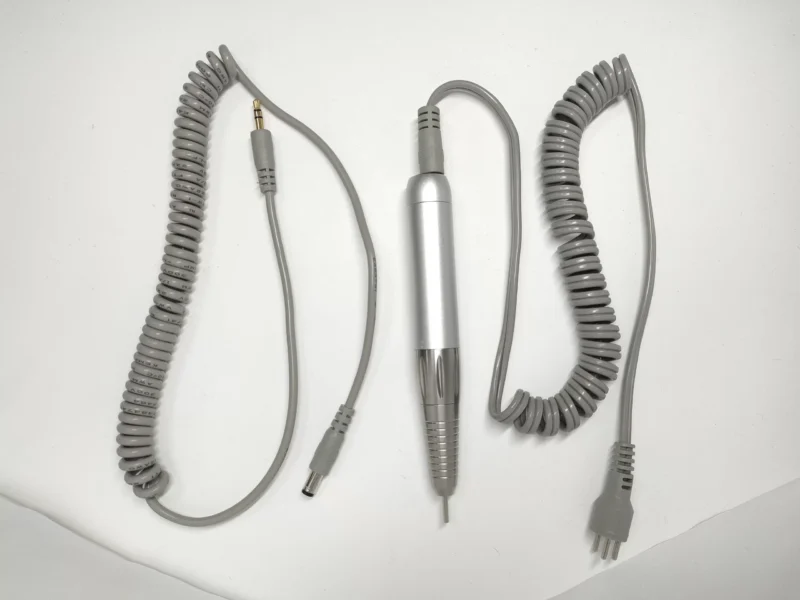 A TP-339 Coreless Handpiece Nail Drill (Compatible with UP200, ManiPro, & Pro Power 20K) featuring a pair of wires and a coiled cord on a white surface.