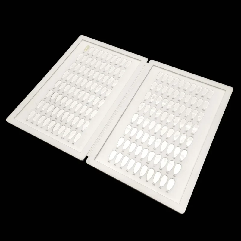 The Acrylic Nail Art Color Chart Display Book comes with a white tray featuring numerous holes.