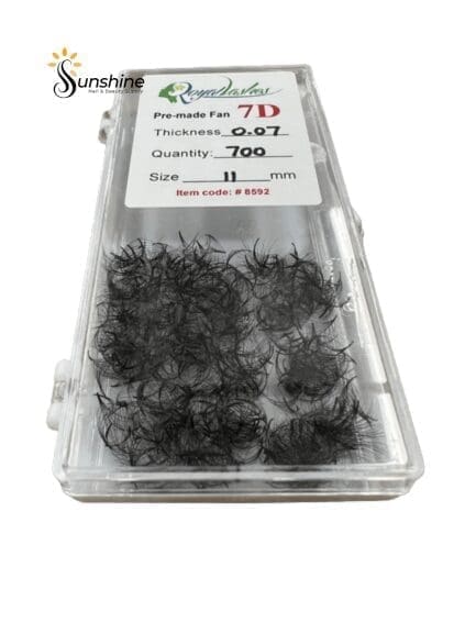 A package of ROYAL LASHES 7D Pre-Made Fan Individual Lash 0.07 (700pcs) in a clear plastic container.