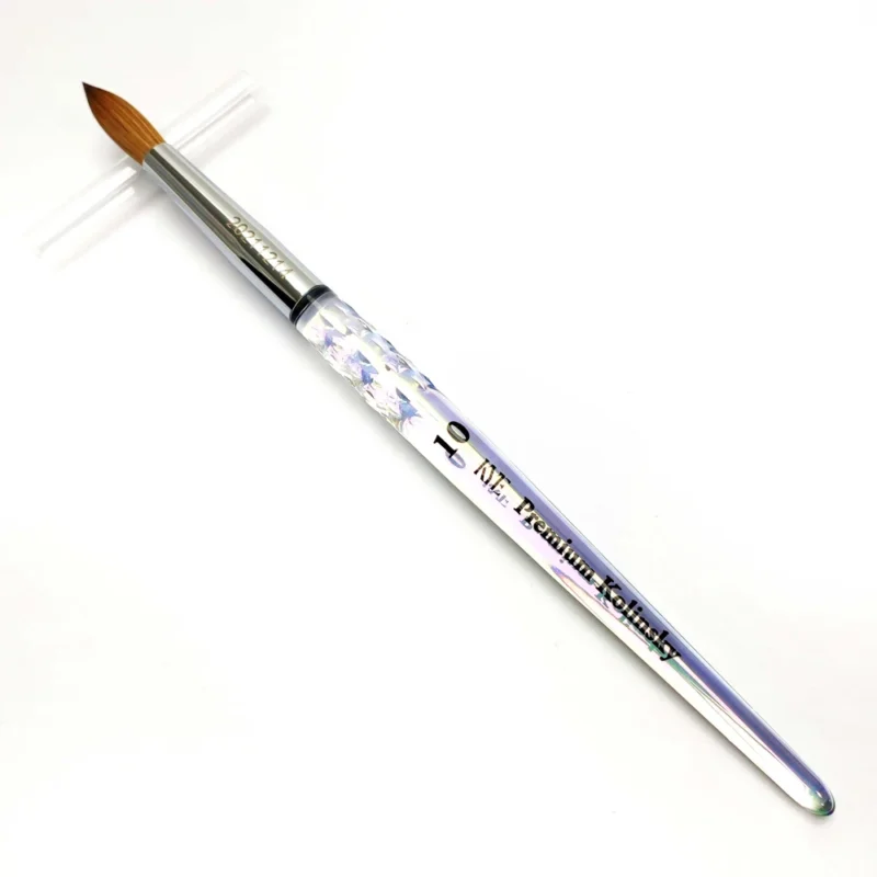 A decorative KYE Premium Acrylic Brush 100% Kolinsky Hair with a holographic handle and silver ferrule.