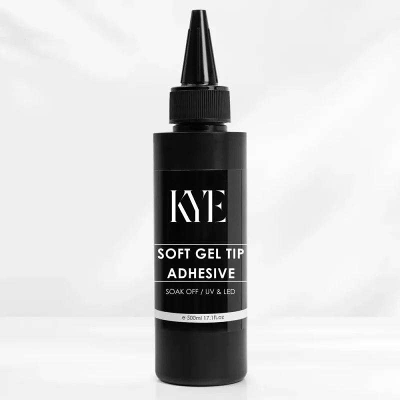 A black bottle labeled "KYE Soft Gel Tip Adhesive Refill 120ml" with a pointed dispenser cap, perfect for refilling your smaller containers, containing 500 ml (17.11 fl oz) of product.