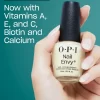 A hand holding a bottle of OPI Nail Envy Tri-Flex Technology 0.5oz, featuring a new vegan formula containing vitamin E, A, biotin.