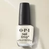 A bottle of OPI Nail Envy Tri-Flex Technology 0.5oz on a beige surface.