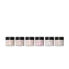 Seven bottles of CND Sculpting Powders 3.7oz in varying shades displayed in a row against a black background.