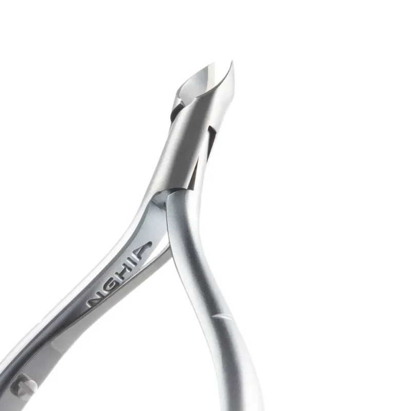 Sentence with replaced product name: Close-up of Nghia Cuticle Nipper D-05X/C-01 (Jaw 16) stainless steel nail clippers against a white background.