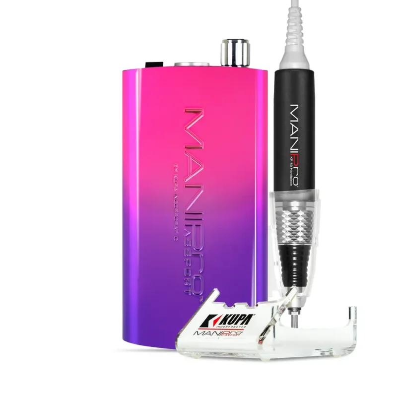 A vibrant pink and purple gradient nail drill labeled "MANIPRO Passport Complete Pixie" with a handpiece attached, isolated on a white background.