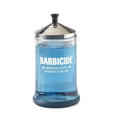 A Barbicide Jar-Midsize disinfectant filled with blue liquid, labeled as fungicide and virucide, with a metallic lid and pump.
