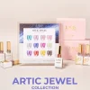 Display of the "Artic Jewel Collection" by Lavis Nails System, showcasing multiple nail polish colors and bottles with AUTO-DRAFT packaging in the background, and a prominent collection label in the forefront.