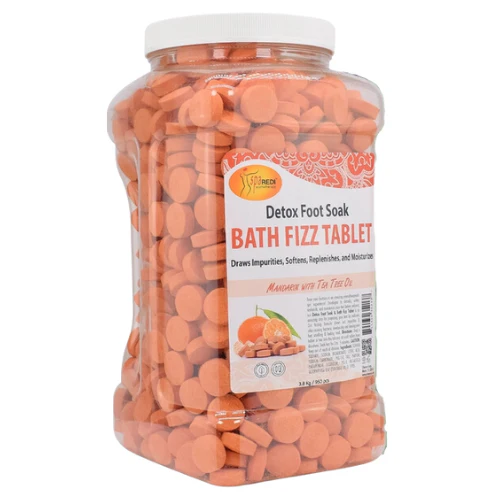 A large clear plastic jar labeled "Spa Redi Bath Fizz 950 Tablet - Lavender & Wildflower 1 Gallon" contains numerous round, orange tablets. The label mentions ingredients like Tea Tree Oil and Lavender, promising to draw impurities and moisturize.