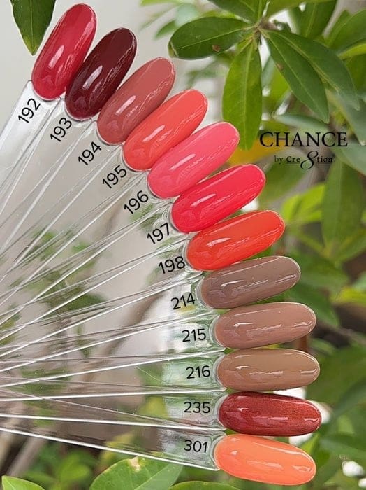 Explore the CHANCE Matching Trio - Hello Autumn Collection featuring 36 nail polish swatches, numbered 192 to 301. This collection offers a stunning array of colors from vibrant reds and pinks to rich earthy tones, all beautifully showcased against a leafy background. Ideal for creating your personalized CHANCE Matching Trio!