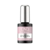 A 15 mL bottle of CND PLEXIGEL Color Builder Peach Moonstone, labeled in black and pink hues, with the text "Builder Gel Gel Sculpt Eur." The cap is silver and reflective. This Color Builder in Peach Moonstone adds a touch of elegance to your nail enhancements.