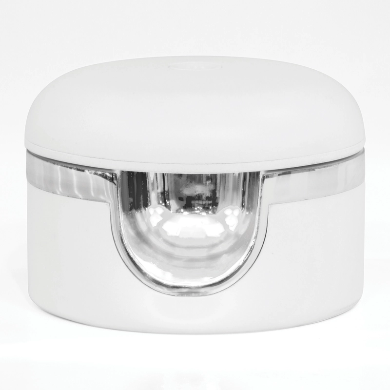 A white, cylindrical container with a clear, curved cutout section revealing a shiny, reflective interior; perfect for holding your Gelish Solid Cream Gel Polish from the Starter Kit - BOLD.