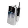 A silver and white portable nail drill machine with a corded handpiece, the ManiPro Passport Next Complete White features a digital display showing "30" on its screen and is labeled "MANI PRO PASSPORT NEXT.