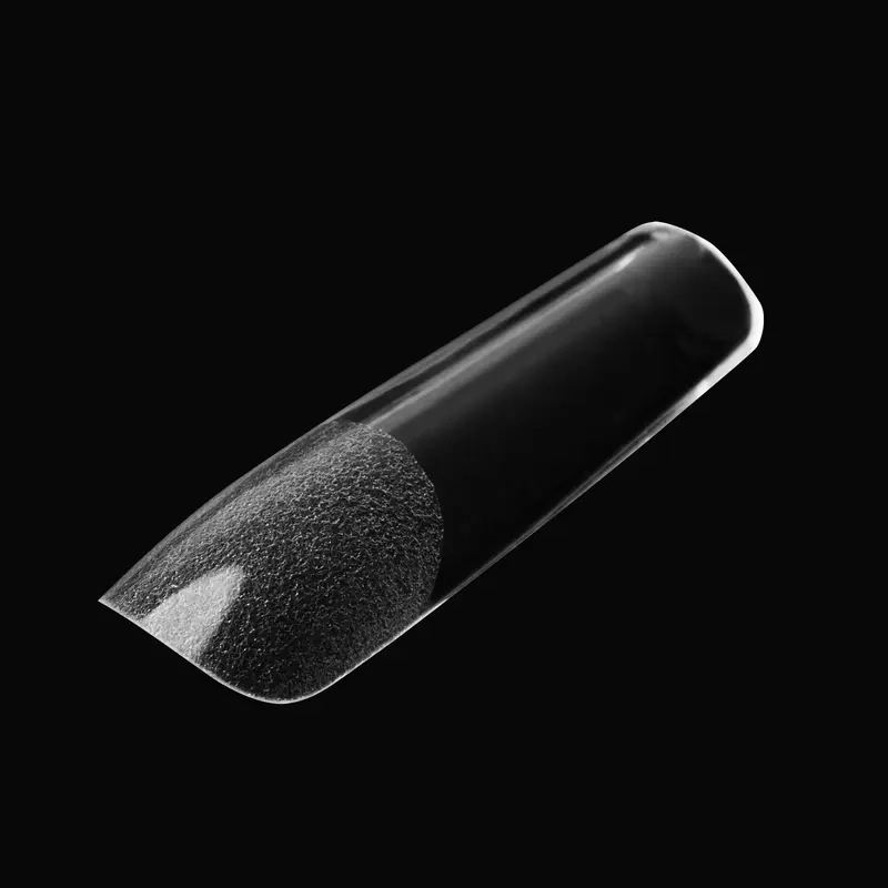 Close-up of a black matte nail design on a Kupa ENRICHRx Sof Gel Tip 550ct. SQUARE against a dark background, highlighting the precision and elegance inherent in ENRICHRx's artistry.