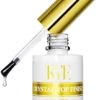 A bottle of KYE Crystal Top Finish nail polish featuring a gold cap and brush, designed for compatibility with the KYE Rubber Base 0.5oz (NO HEMA). The text reads "No Wipe UV/LED, 15ml - 0.5fl. oz." Enjoy a flawless finish with the NO HEMA formula for safer application.