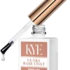 The nail polish bottle marked as "KYE Rubber Base 0.5oz (NO HEMA)" comes with a gold cap and an applicator brush smoothly inserted inside, ensuring a flawless foundation for any manicure masterpiece.